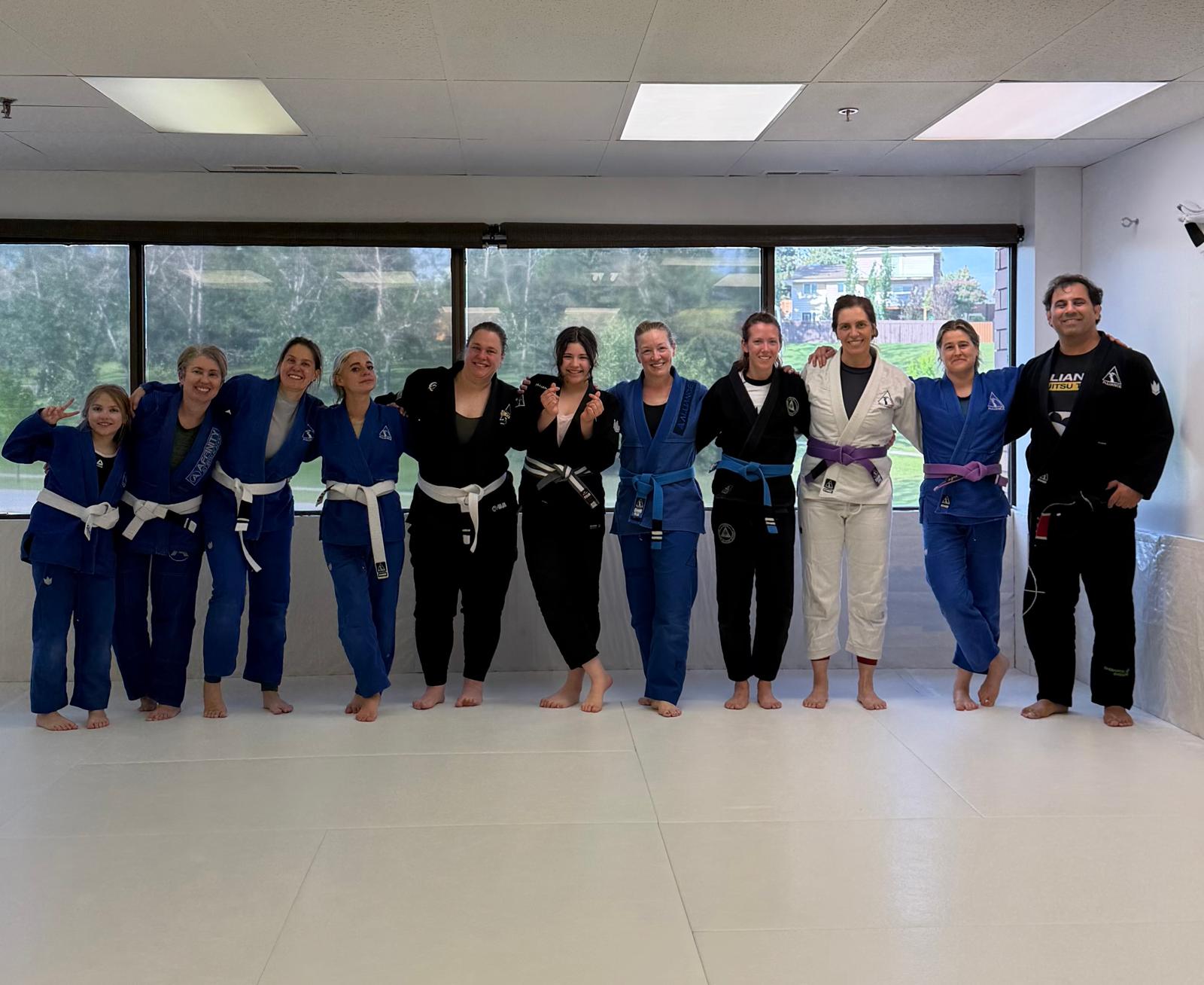 Adult Brazilian Jiu-Jitsu class training together